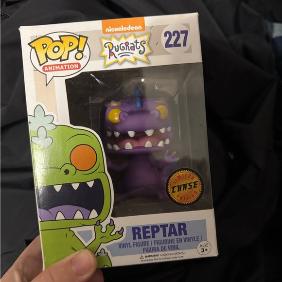 Funko Purple Reptile Figure with Iconic Features - Picture 1 of 2